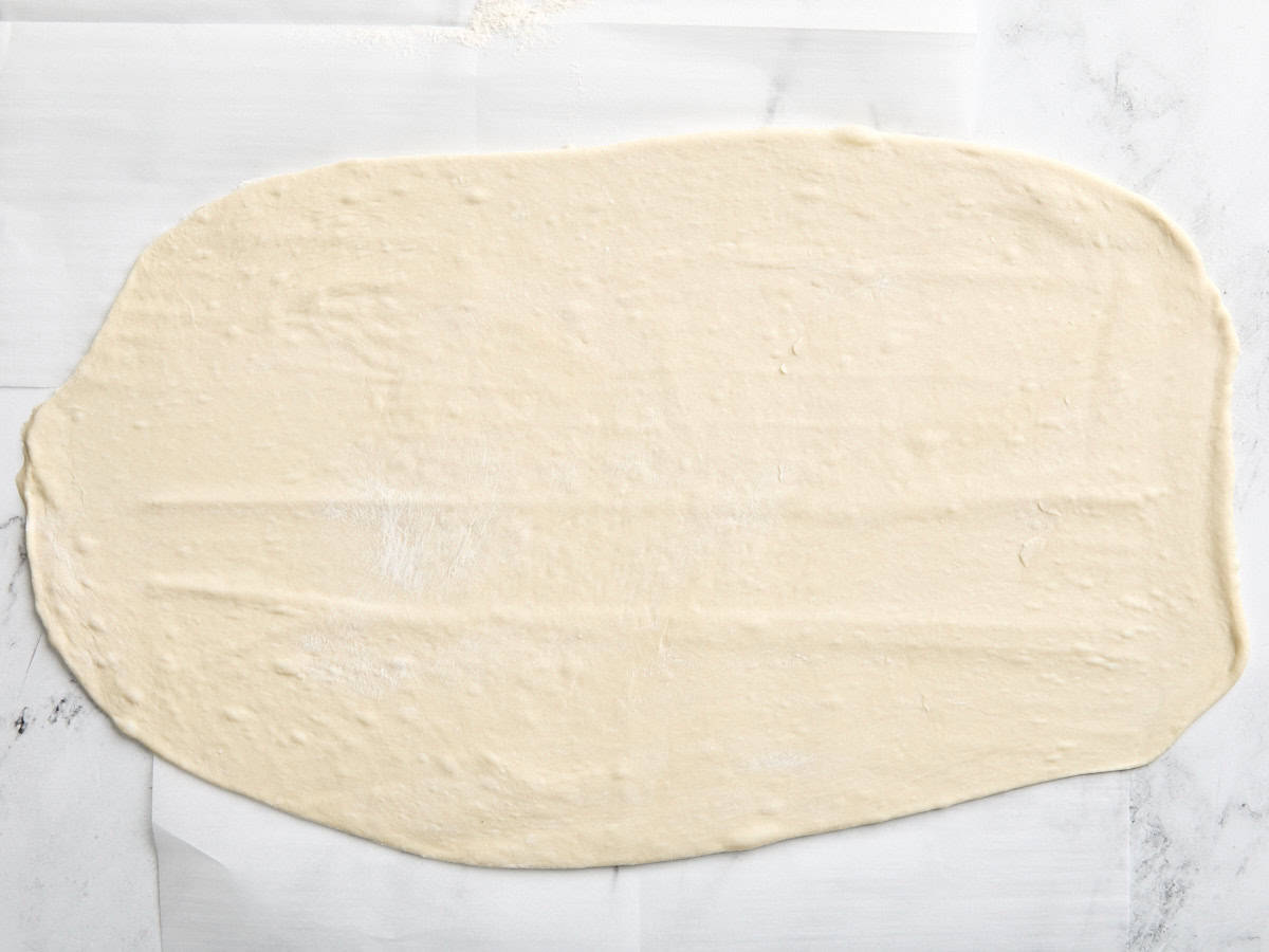 Pâte à pizza étalée